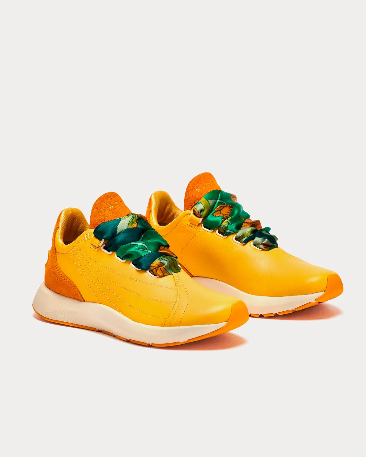 Two Yellow Low Top Sneakers
